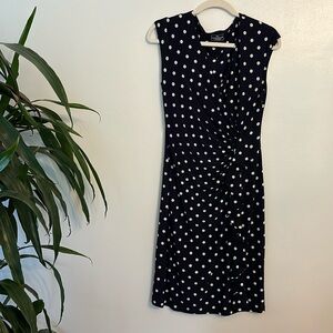 Stretchy navy and white polka dot midi dress.